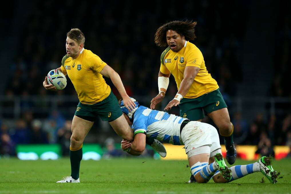 Breakaway: Drew Mitchell's late run sealed the game for Australia. Photo: Getty Images