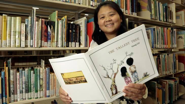 Xiang (Emma) Lei with her winning book <i>The Tallest Tree</i>. Photo: Jeffrey Chan