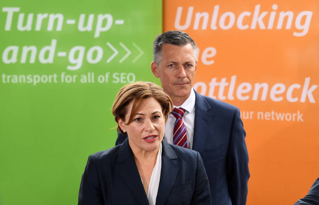 Queensland Acting Premier Jackie Trad (left) and Cross River Rail Delivery Authority CEO Graeme Newton announce the five short-listed consortia bidding to build Brisbane's underground rail. Photo: AAP