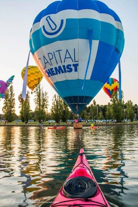 Justin Galbraith who flies the Capital Chemist balloon is know for skimming the lake. Photo: supplied