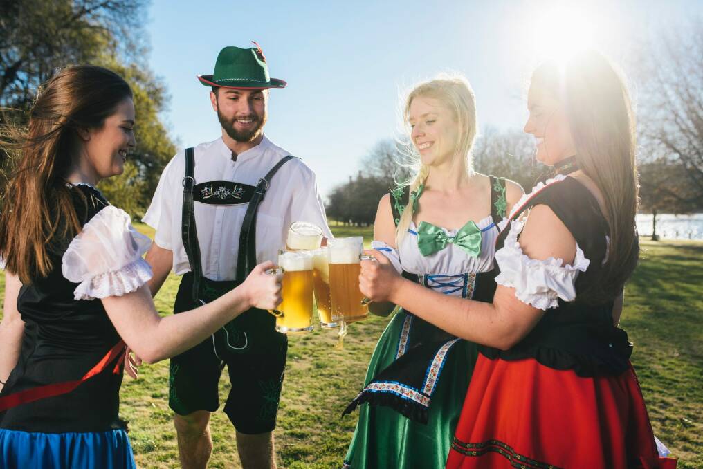 Maddie Welsh, Patrick Gallagher, Zoe Kooyman, and Carly Farmington enjoying a stein at the Patrick White Lawns in Parkes ahead of the new Oktoberfest Parklands. Photo: Rohan Thomson