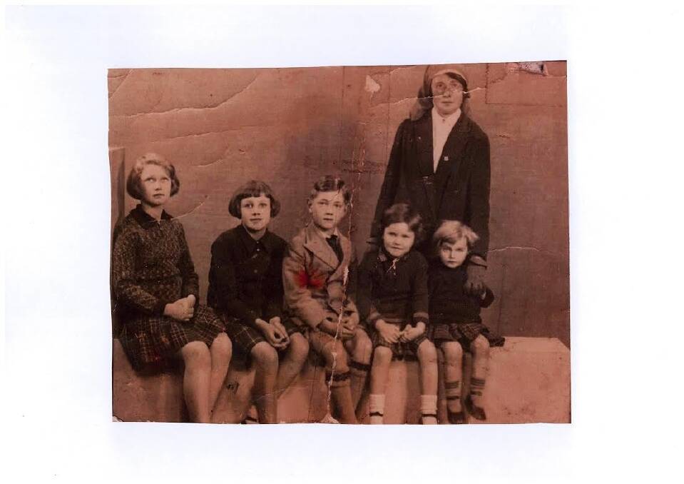 Ms Field as a child (far right) with her beloved nanny, who took the place of her emotionally distant mother. Photo: Supplied