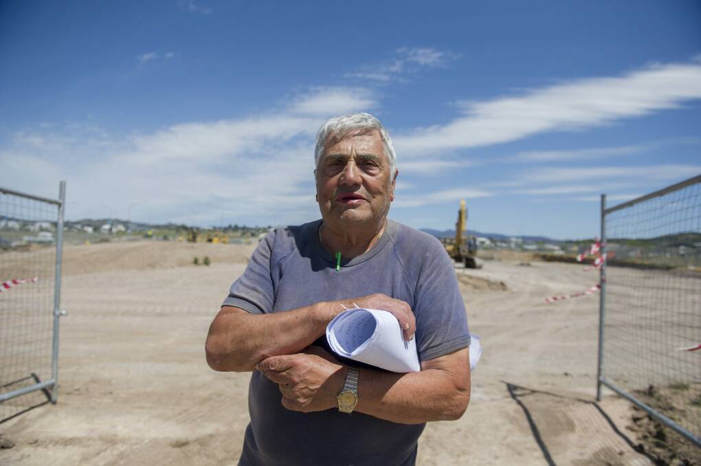 Veteran Canberra developer Renato Cervo on site of the proposed shopping centre for Coombs last October. Photo: Jay Cronan