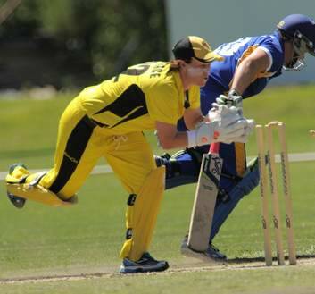 Meteors batter, Kris Britt just makes her ground as Fury wicketkeeper, Jenny Wallace, breaks the stumps. Photo: Graham Tidy