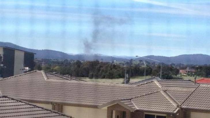 Smoke spotted above a fire in Mitchell this morning. Photo supplied by Adam Ciaccia (@AdamCiaccia) via Twitter.