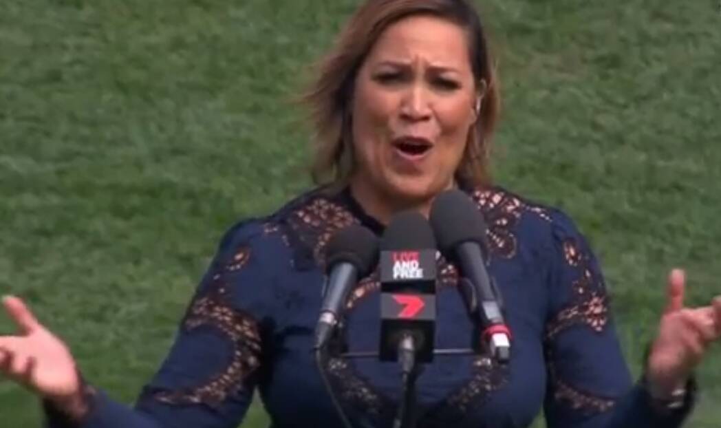 Kate Ceberano singing the national anthem at the AFL grand final.