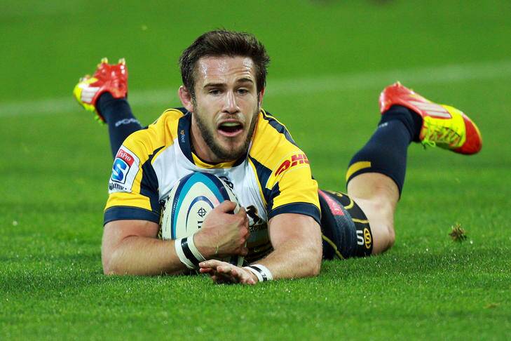 Zack Holmes scores a brilliant solo try for the Brumbies last night. Photo: Getty Images