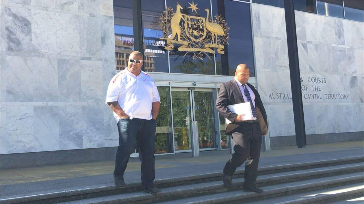 Halafihi "Fihi" Kivalu, left, leaves the ACT Supreme Court on Thursday with his lawyer Toni Tu'ulakitau, right Photo: Christopher Knaus