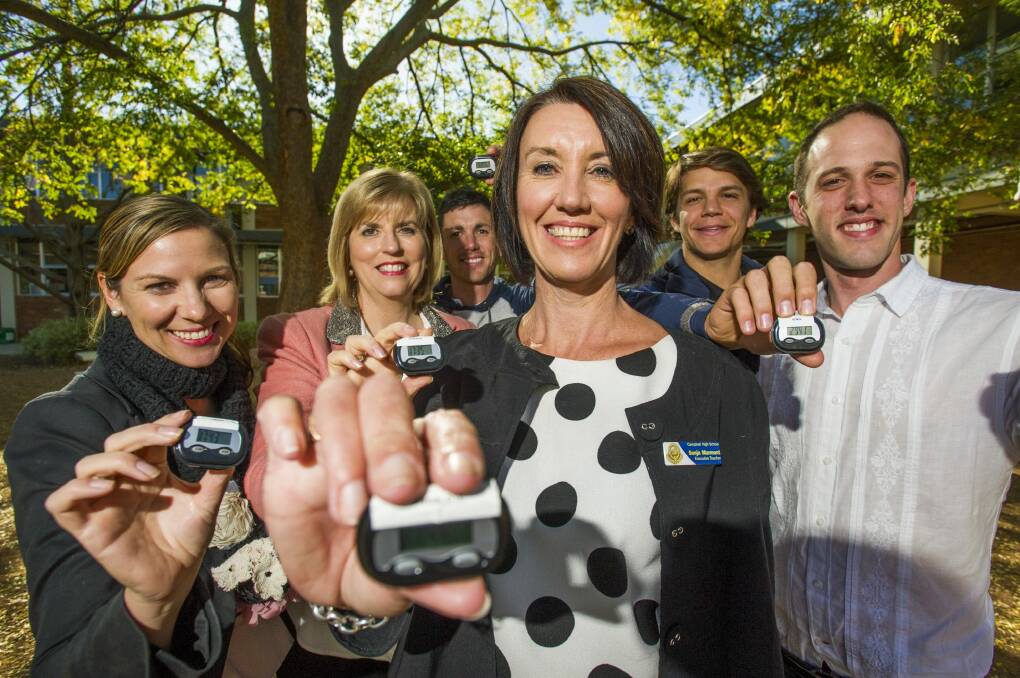 Sonja Marmont with teachers (l-r) Susan Daintith, Principal Heather Paterson, John Fitzgerald, Tom Rodriguez, Nick Carey-Ide of Campbell High have taken on the pedometer challenge. Photo: Jay Cronan