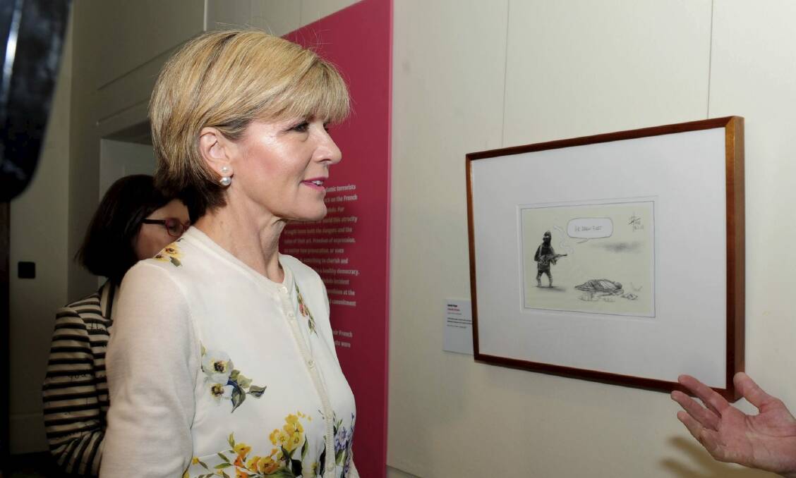 Canberra Times cartoonist David Pope's "He drew first" sketch is one of 80 cartoons in this year's exhibition.  Photo: Graham Tidy