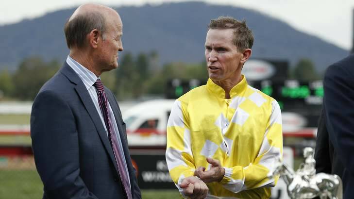 Trainer David Payne chats with jockey Glyn Schofield after the Black Opal Stakes. Photo: Jeffrey Chan