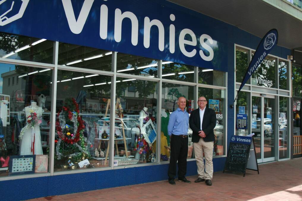 St Vincent de Paul ACT director Paul Quinn with ActewAGL's manager of energy efficiency Todd Eagles. Photo: Supplied