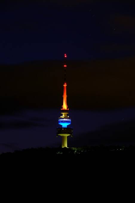 Telstra Tower on Black Mountain lit up in the colours of the French flag. Photo: Dimitri Tolleter