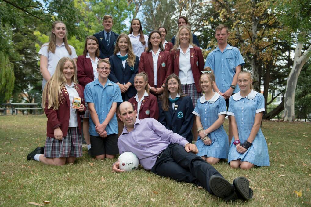 Canberran Matt Napier, who kicked a soccer ball across Africa to raise awareness of poverty, helped launch  Caritas Australia'ss annual fundraising appeal, Project Compassion at St Clare's College on Ash Wednesday, with students from Catholic schools around Canberra also attending. Photo: Jay Cronan