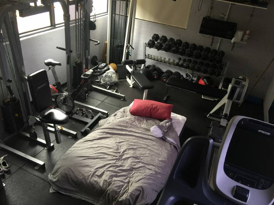 The cramped quarters at their airport station has forced some to sleep in the gym surrounded by weights.  Photo: Supplied
