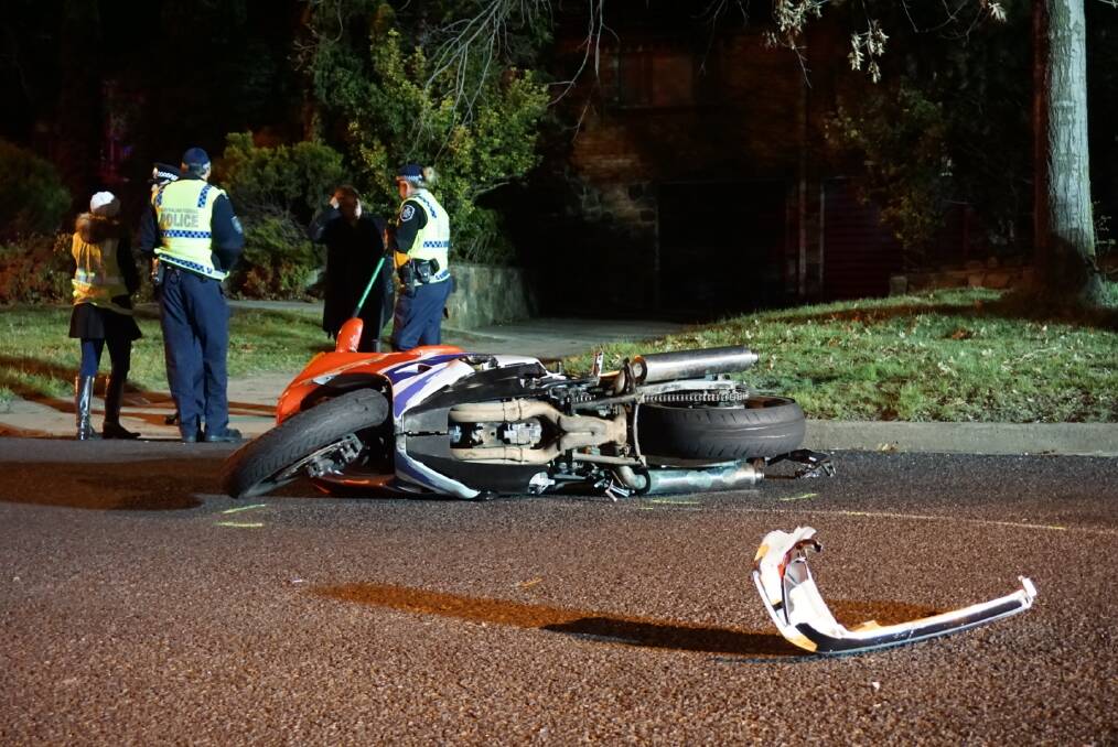 A 43-year-old Pearce man has died after a car and motorbike collided in Red Hill on Saturday night. Photo: John Paul Moloney