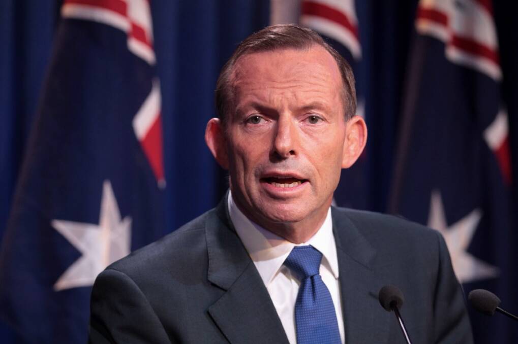 Prime Minister Tony Abbott said the difference between Australia and the rest of the world was that "when we make commitments to reduce emissions we keep them". Photo: Andrew Meares
