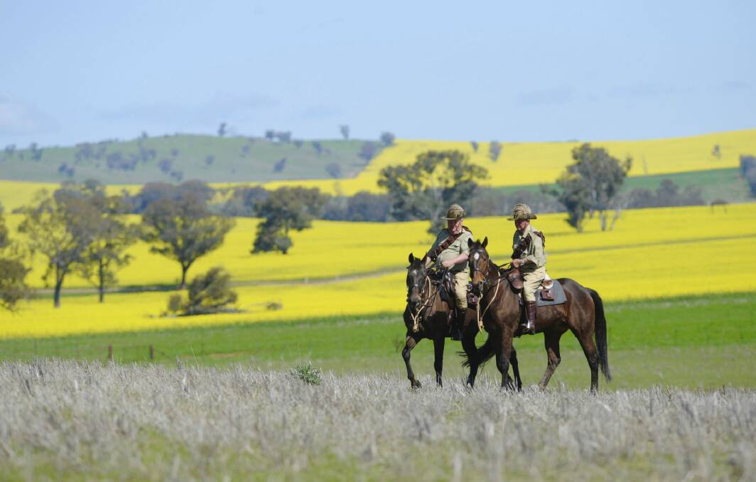 Light Horsemen Graham Brown and Neil Hughes approaching  the little town of Illabo  in the Riverina, during their re-enactment of the Kangaroo March. Photo: Graham Tidy