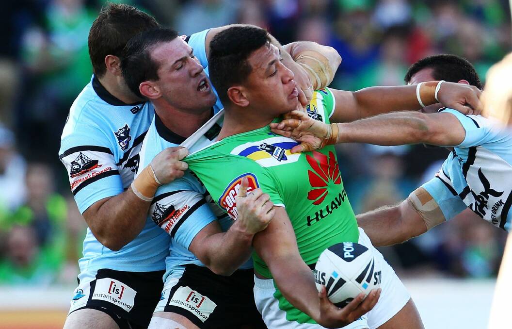 Old sparring partners: Paul Gallen tackles Josh Papalii during the 2012 NRL finals. Photo: Getty Images