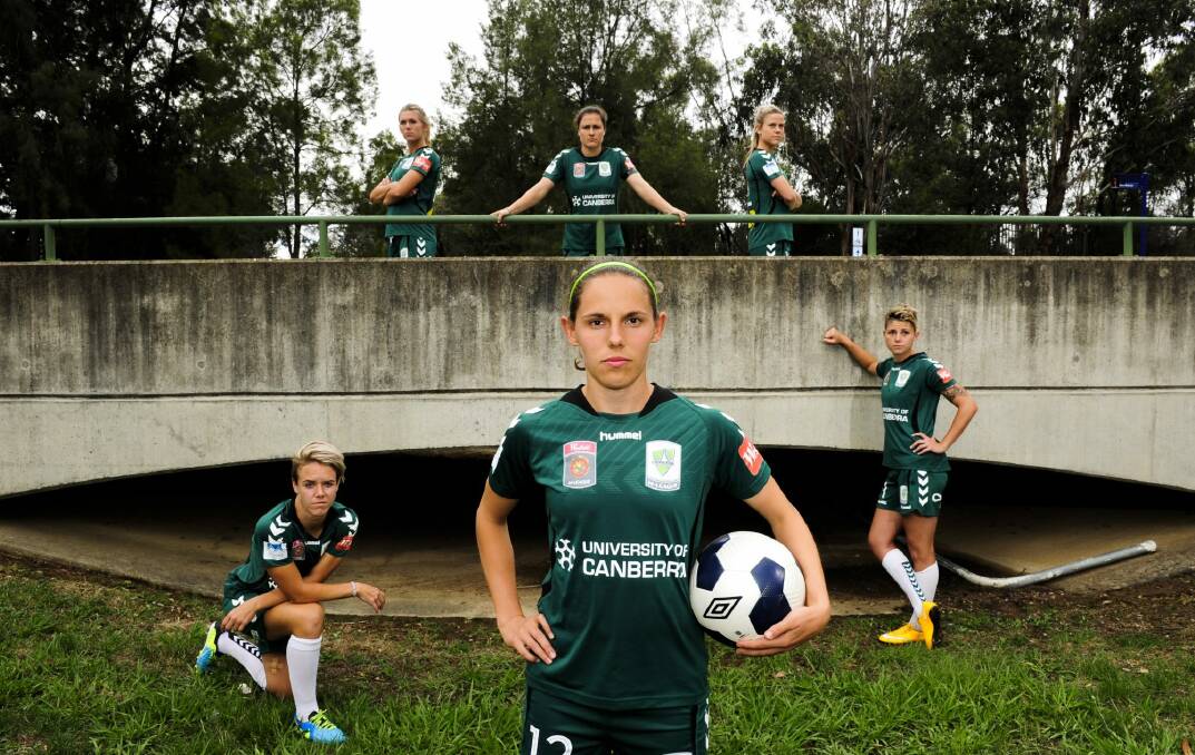 Canberra United players Lori Lindsey, Nicole Begg, Michelle Heyman and back from left, Stephanie Ochs, Kendall Fletcher and Sally Rojahn will take on the Melbourne Victory in the W-League semi-finals. Photo: Melissa Adams 