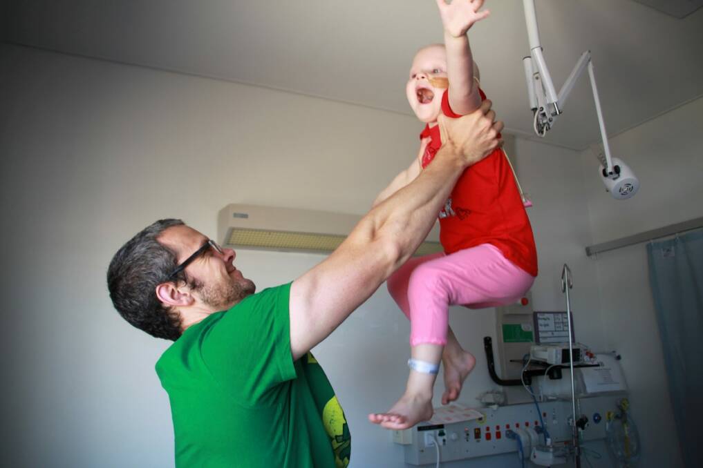 Annabelle Wright and dad David celebrating her discharge from hospital on Christmas Eve 2012. Photo: Supplied