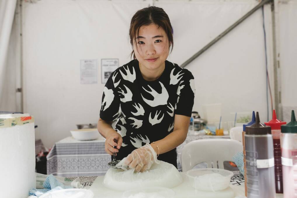 The 2018 National Multicultural festival on Sunday afternoon. Cheri Ji of the Jasmine House stall makes crystal jelly noodles.  Photo: Jamila Toderas