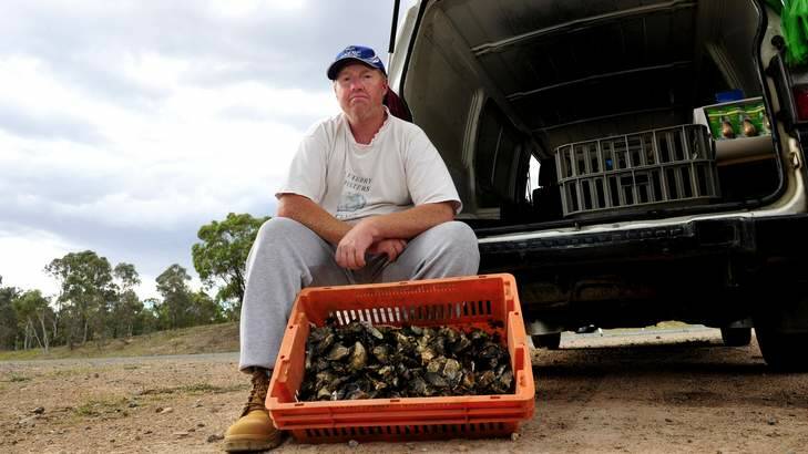 Colin Terry sells oysters on Sulwood Drive. Photo: Melissa Adams