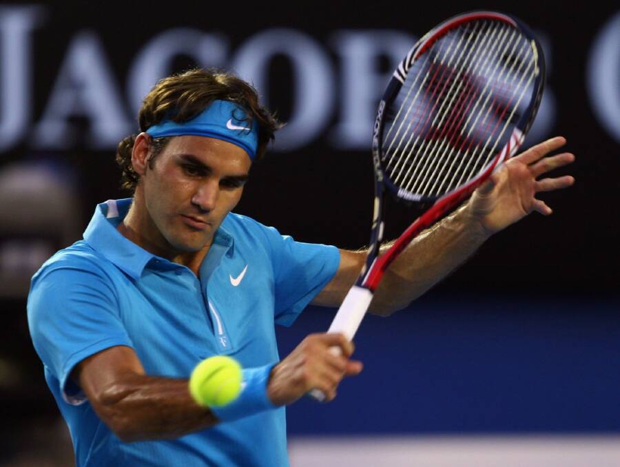 Roger Federer plays a backhand during the men's final against Andy Murray on January 31, 2010. Photo: Getty Images