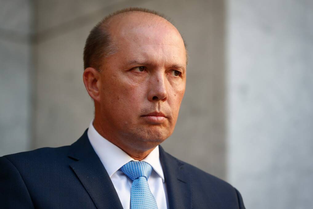 Immigration Minister Peter Dutton has blamed Labor for the payout. Photo: Alex Ellinghausen
