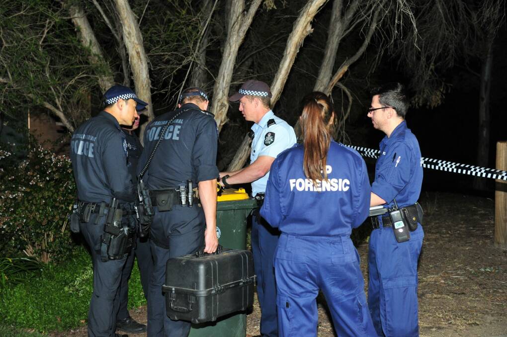 ACT police and forensics officers on the scene. Photo: Melissa Adams