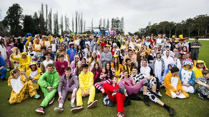 The Onesie Funsie Walkie Runsie launch at Canberra Grammar. Students dressed in Onesies in front of the Snowy Hydro SouthCare Rescue Helicopter. Photo: Rohan Thomson