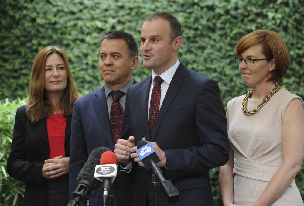 Chief Minister Andrew Barr at the announcement of his expanded cabinet in January, with, from left, now deputy Yvette Berry, defeated MLA Chris Bourke and Meegan Fitzharris.  Photo: Graham Tidy