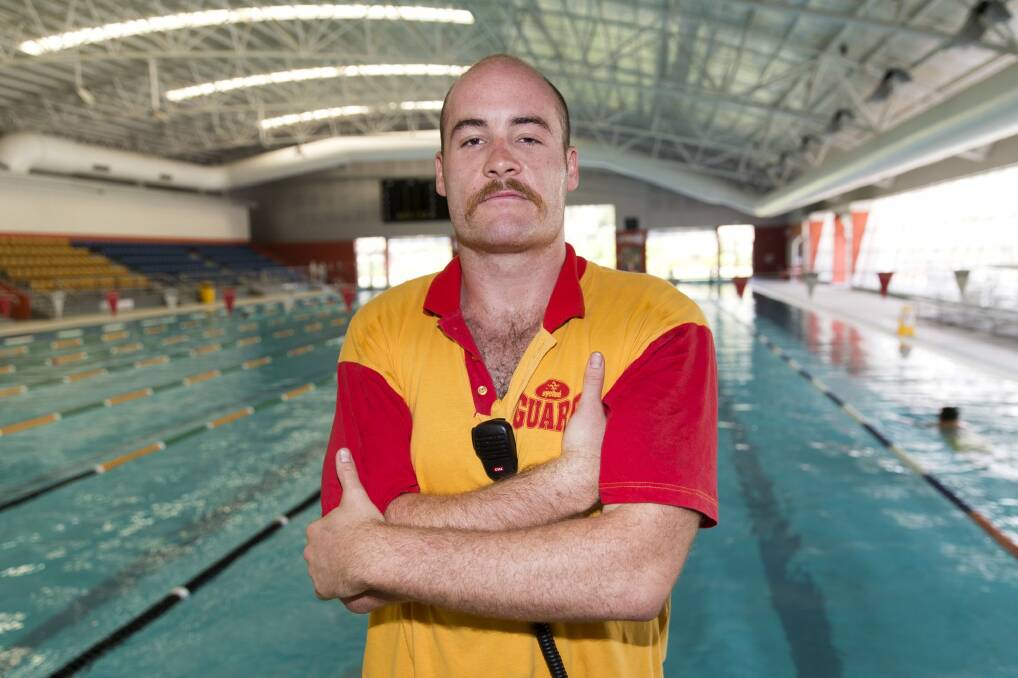 Lifeguard Seamus Leyland on duty at the CISAC Swimming pool in Bruce. Photo: Ray Vance