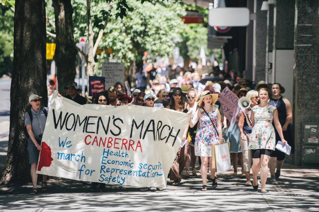 Hundreds of Canberrans march in the Women's March in the city. Photo: Rohan Thomson