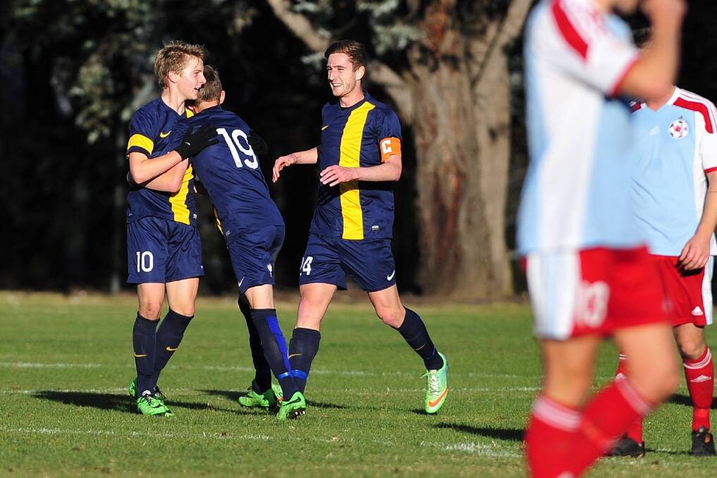 Jamie Dimitroff, left, got on the scoresheet for the FFA Centre of Excellence. Photo: Jeffrey Chan