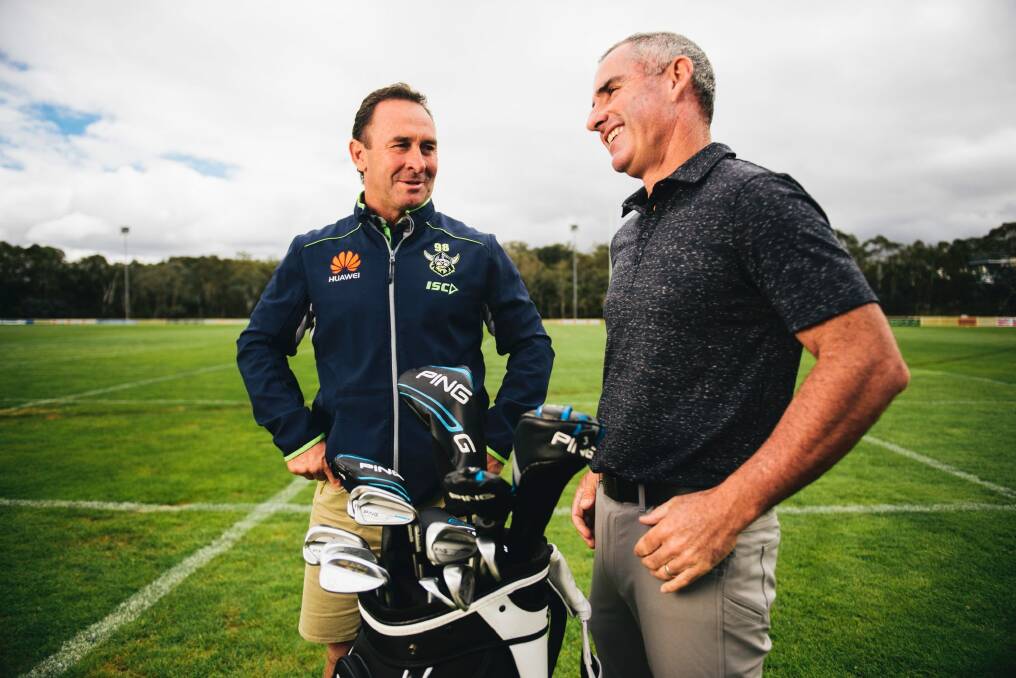 Matt Millar with Canberra Raiders coach Ricky Stuart. Photo: Rohan Thomson