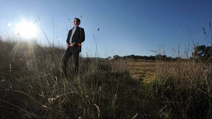 Chris Reynolds from the LDA on the site of the new suburb of Moncrieff north of Ngunnawal. Photo: Andrew Sheargold