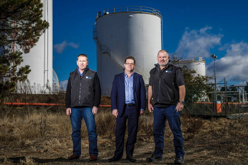 Director of Capital Recycling Solutions Adam Perry, Dean Ward from ActewAGL, and project manager Ewen McKenzie at the former Shell site marked for a waste-to-energy factory at Fyshwick. Photo: Sitthixay Ditthavong