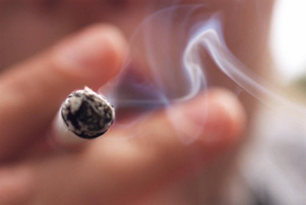 Tax including GST on any cigarette is currently a minimum 59c per stick. Photo: Tamara Voninski