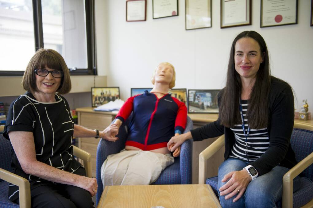 Emily Molan (right) and Professor Mary Cruickshank with a resuscitation  manikin.
 Photo: Jay Cronan