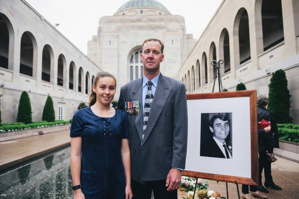 The last post ceremony for Terrance Langlands at the National War Memorial. Langlands family, (nephew and his daughter) David and Amber Langlands. Photo: Rohan Thomson