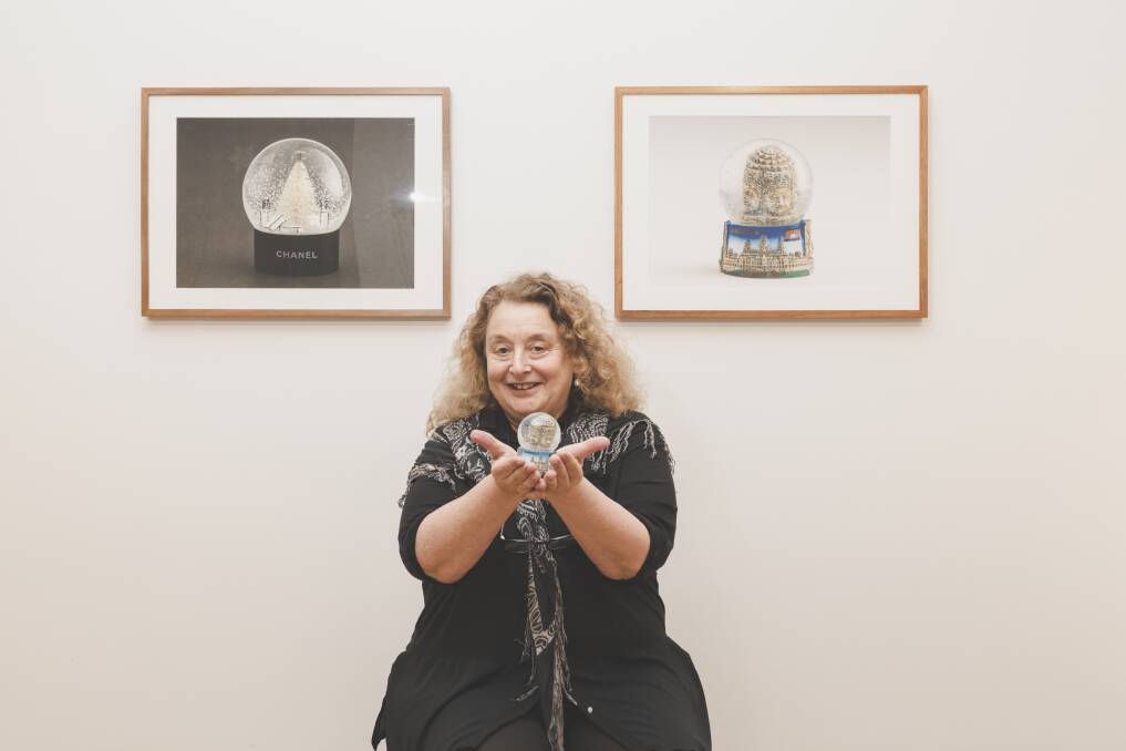All shook up: Sally Hopman with some of her snow domes in the new exhibition. Photo: Jamila Toderas
