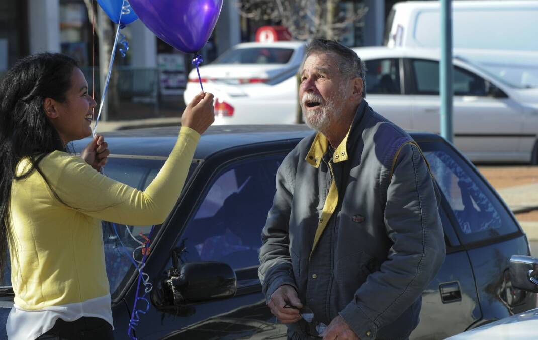 Ronald "Tex'' Davis of Charnwood was delighted to receive a balloon from Elizabeth Kikkert. Photo: Graham Tidy