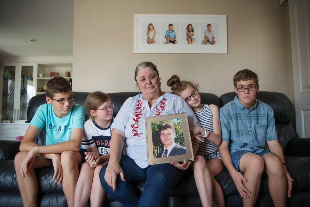 Elizabeth Vidler's son, Christian died in a crash on the Hume Highway in September. He left four children behind. From left to right: Declan 13, Tarmia 8, Liz Vidler, Marquisha 11, Lauchlan, 15, at their Bradbury home.  Photo: Louise Kennerley