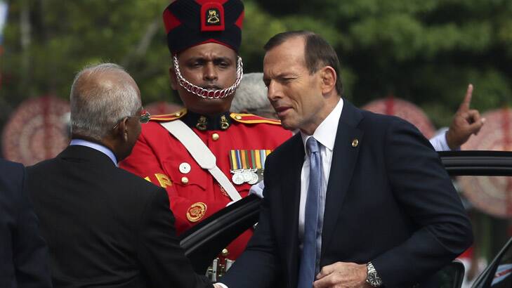 Prime Minister Tony Abbott arrives for the opening ceremony of the Commonwealth Heads of Government meeting in Colombo. Photo: Reuters