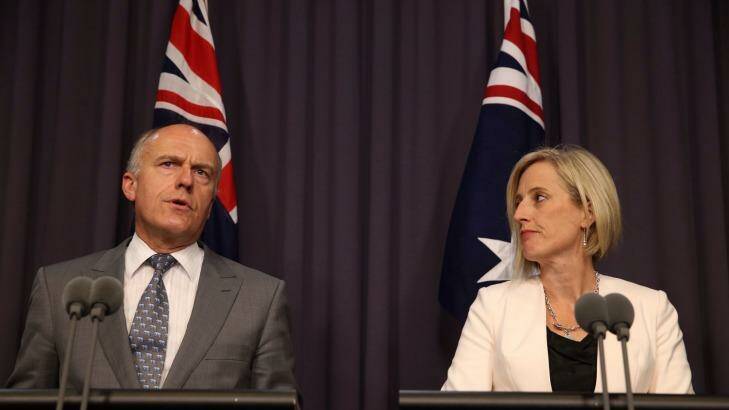 ACT Chief Minister Katy Gallagher and Federal Employment Minister Senator Eric Abetz announce a $1 billion federal loan to resolve the Mr Fluffy asbestos crisis in the ACT. Photo: Andrew Meares