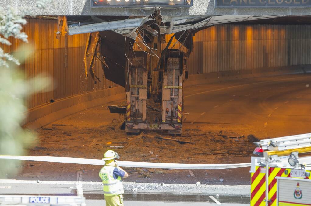 The truck and excavator stuck inside the tunnel after the October 20 accident. Photo: Jay Cronan