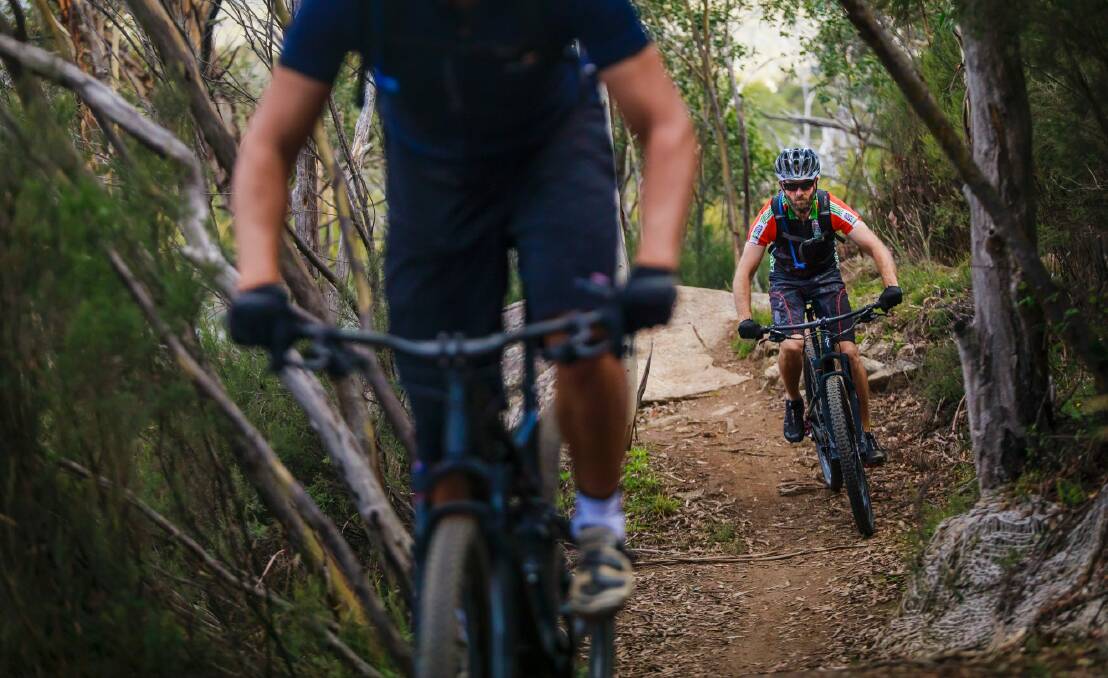 Craig Trevallion and Jay Williams explore the extension of the Thredbo Valley Track for the first time. Photo: Sitthixay Ditthavong