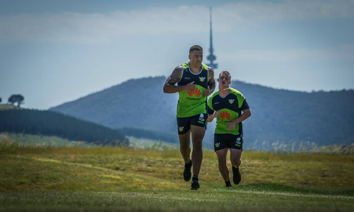 On track: Jordan Turner (left) and Connor Cheeseman train at Stromlo Forest Park. Photo: Karleen Minney