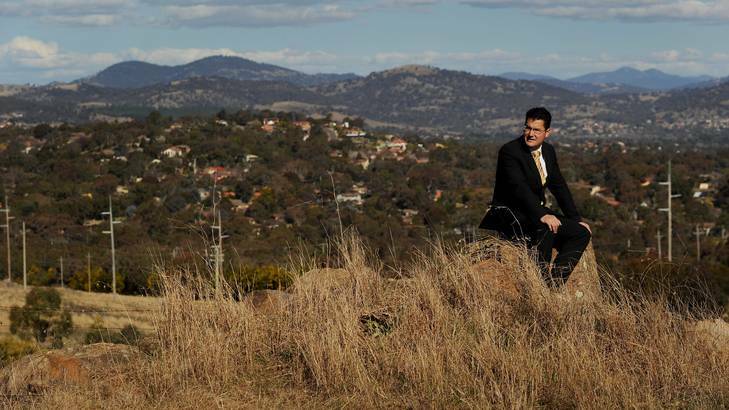 Liberal party leader Zed Seselja overlooking houses in South Canberra  from Mt Taylor. Photo: Colleen Petch